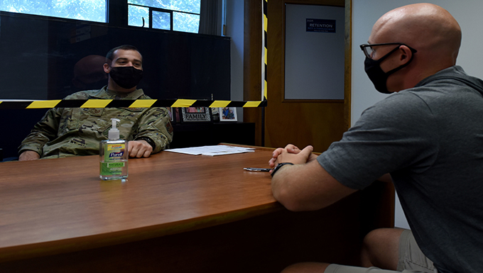Tech. Sgt. alex Wagner engages in coversation with a potentional recruit.